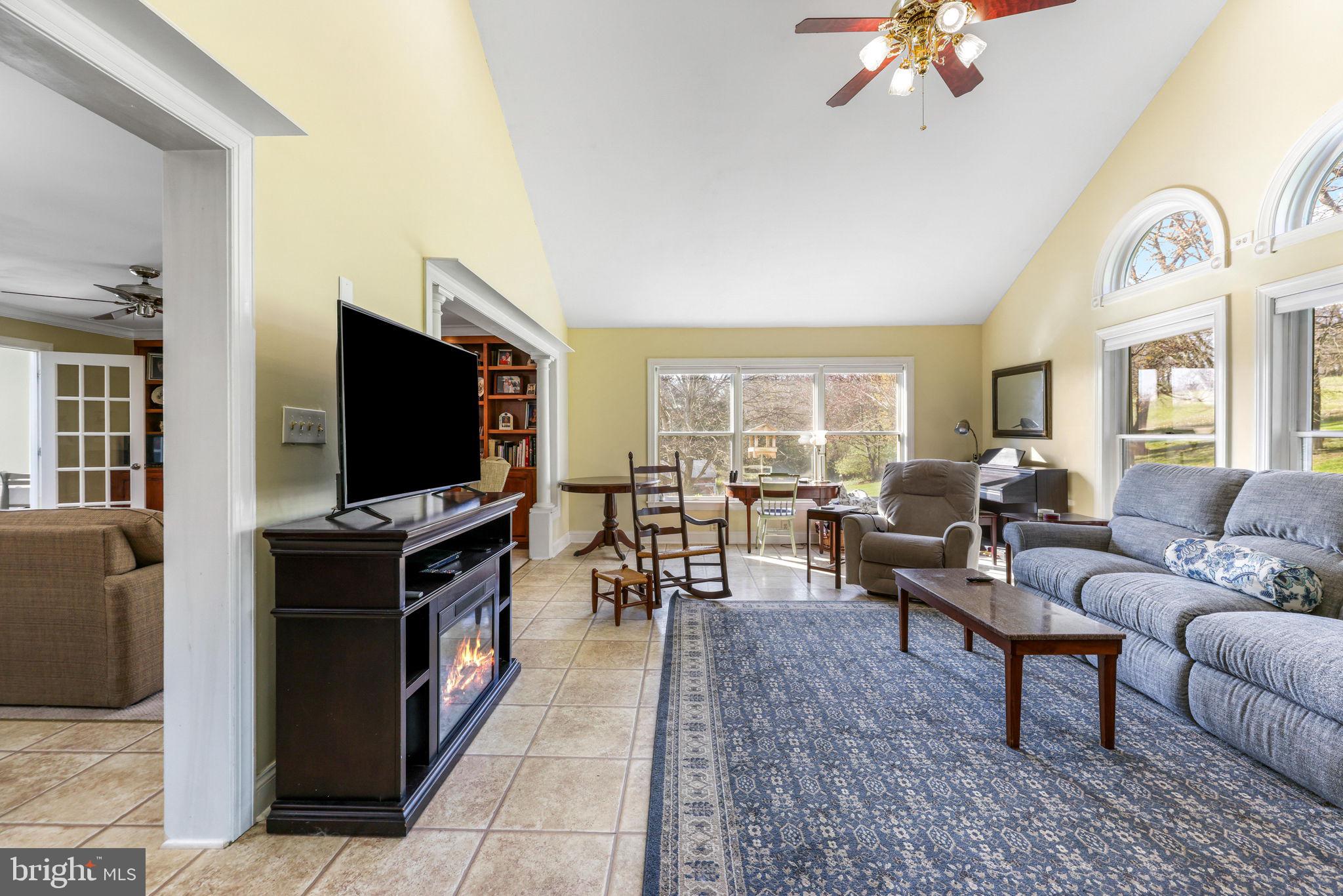 21310 West Liberty Road Parkton, MD 21120 - Photo 40 of 111 a living room with furniture and a flat screen tv