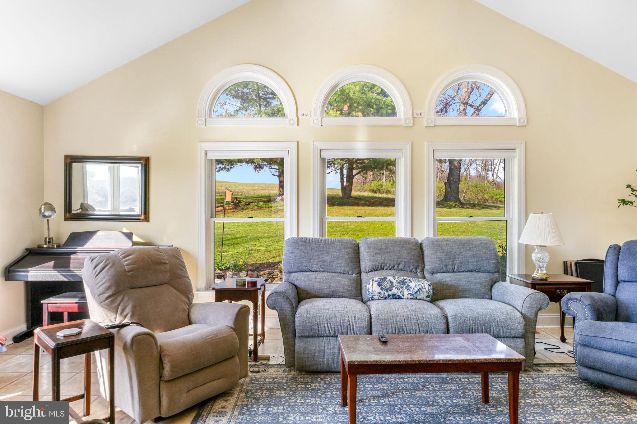 21310 West Liberty Road Parkton, MD 21120 - Photo 42 of 111 a living room with furniture and a large window