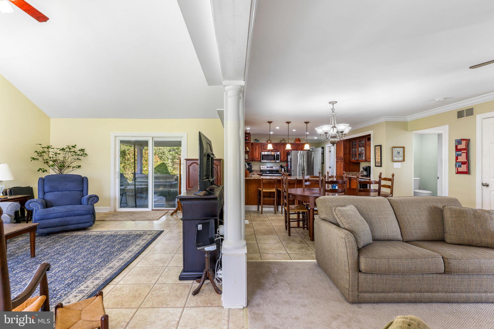 21310 West Liberty Road Parkton, MD 21120 - Photo 43 of 111 a living room with furniture and a chandelier