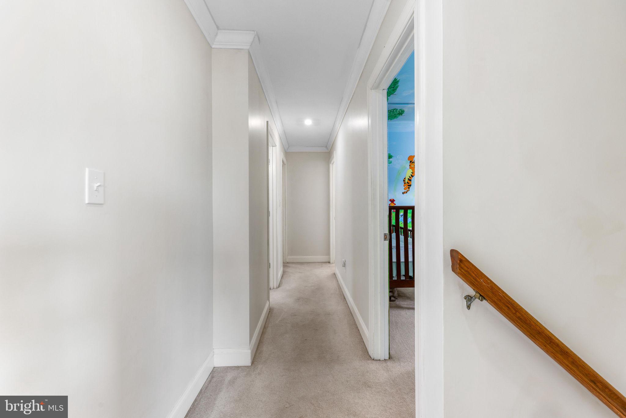 21310 West Liberty Road Parkton, MD 21120 - Photo 47 of 111 a view of a hallway with wooden floor and staircase