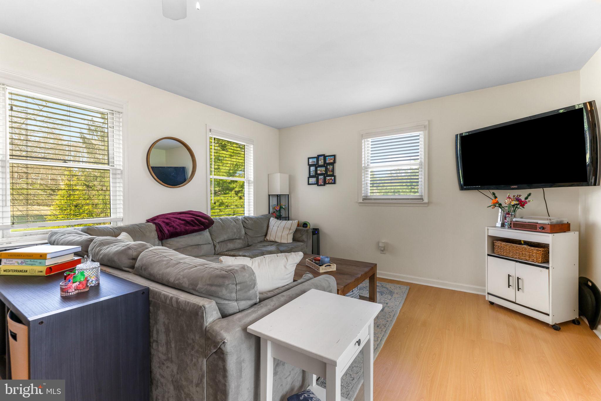 21310 West Liberty Road Parkton, MD 21120 - Photo 57 of 111 a living room with furniture and a flat screen tv