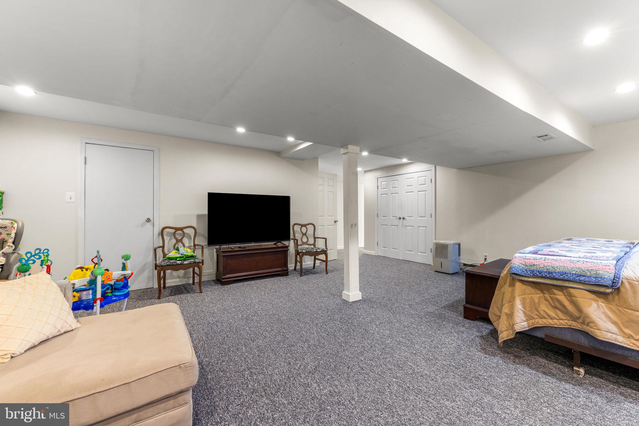 21310 West Liberty Road Parkton, MD 21120 - Photo 78 of 111 a living room with furniture and a flat screen tv