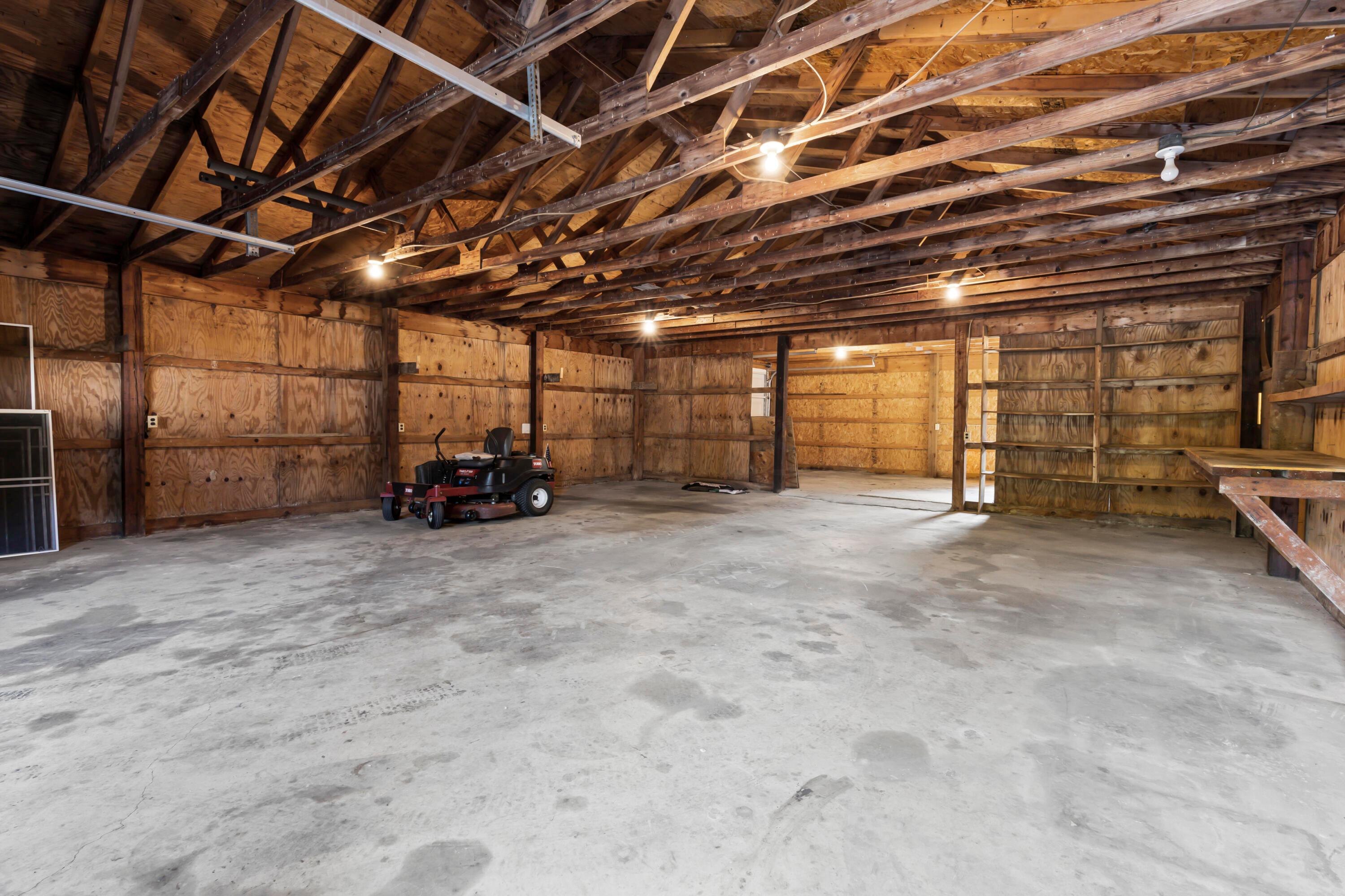 5764 Cheshire Road Galena, OH 43021 - Photo 46 of 59 • Vinyl exterior
• Concrete floor
• Loft area
• Service door
• Electric from house
• (2) garage doors
• Cabinets