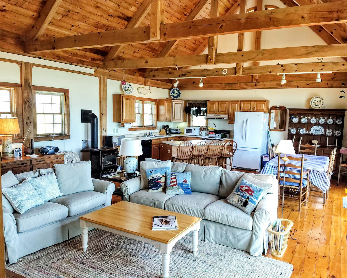 48 Madequecham Valley Road Nantucket, MA 02554 - Photo 3 of 20 a living room with furniture and a kitchen view