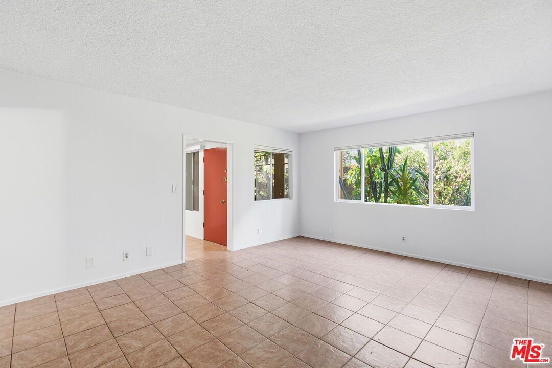 1434 25th Street, Unit 2 Santa Monica, CA 90404 - Photo 2 of 26 an empty room with windows