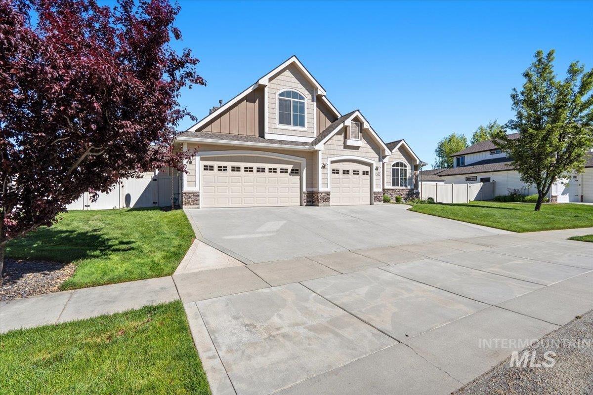 1183 North Buffalo Way Middleton, ID 83644 - Photo 1 of 47 Contemporary two-story residence featuring a neutral exterior, stone accents, and multiple dormer windows