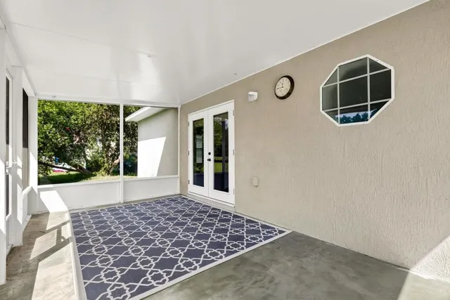 an aerial view of residential houses with outdoor space and street view