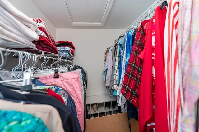 a view of storage and utility room with washer and dryer