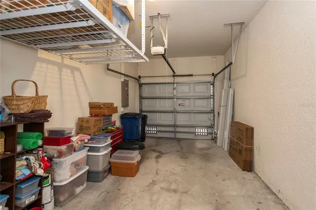 a view of a lake with a house in the background