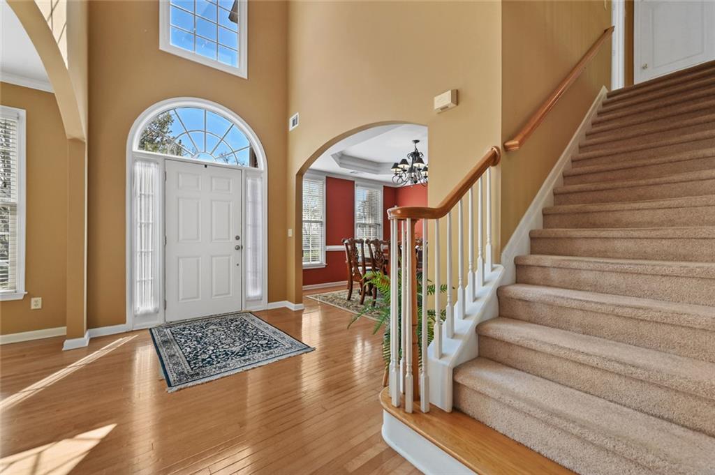 3945 Summit Gate Drive Suwanee, GA 30024 - Photo 12 of 45 a view of an entryway with wooden floor