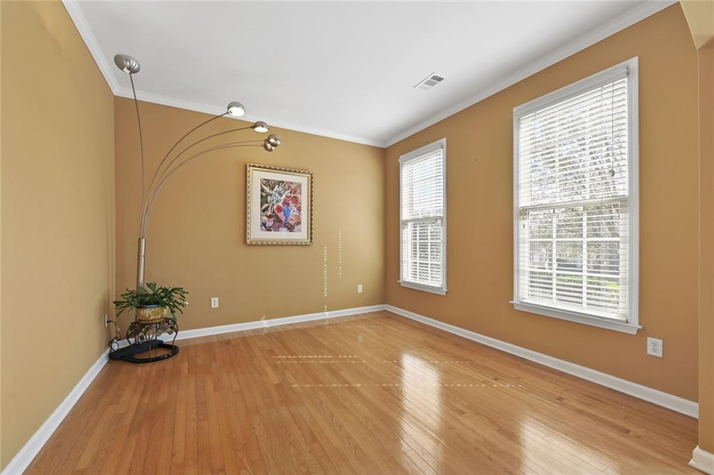 3945 Summit Gate Drive Suwanee, GA 30024 - Photo 13 of 45 an empty room with windows