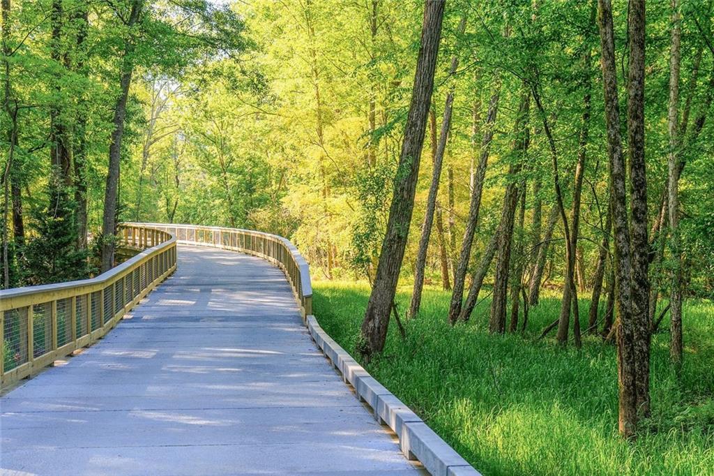 3945 Summit Gate Drive Suwanee, GA 30024 - Photo 9 of 45 a view of flowing water with large trees
