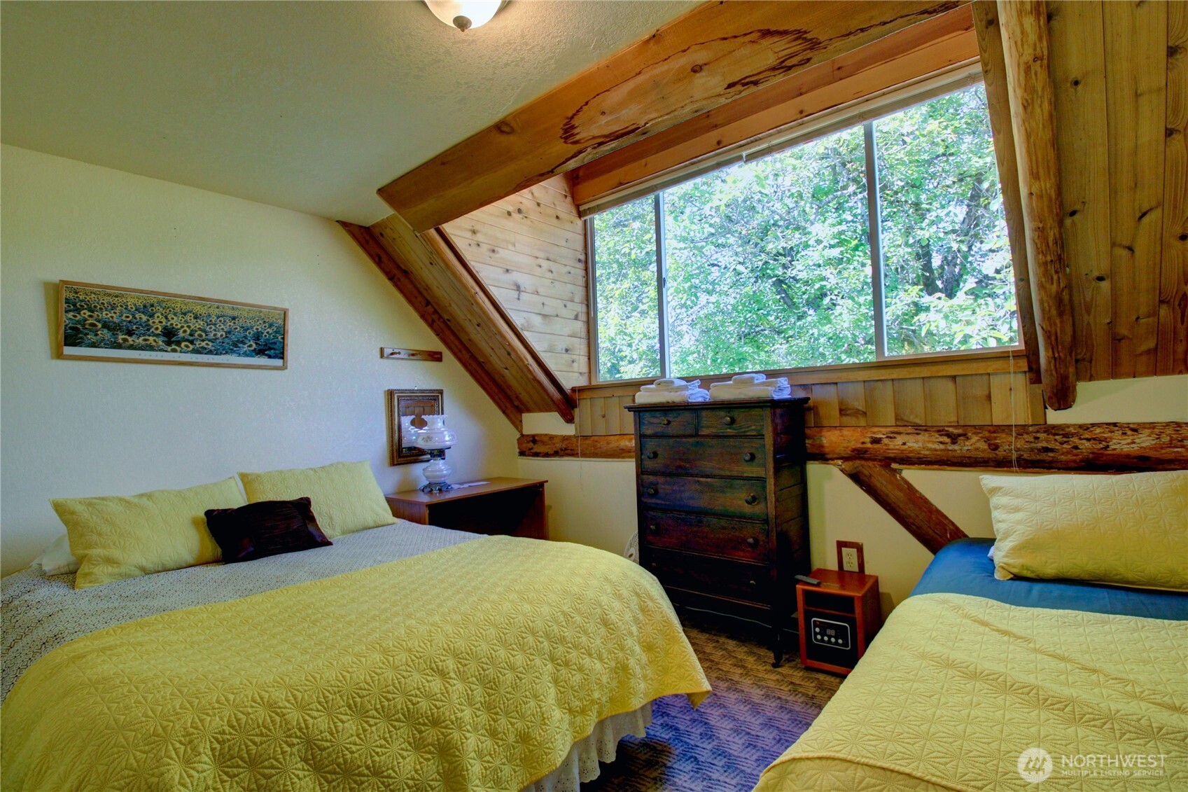 31459 Barben Road Sedro-Woolley, WA 98284 - Photo 14 of 32 a bedroom with a bed and wooden floor