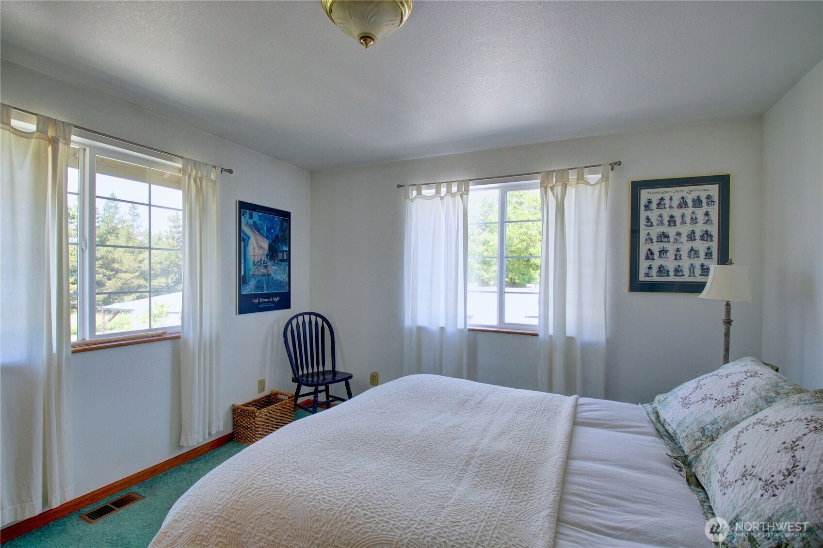 31459 Barben Road Sedro-Woolley, WA 98284 - Photo 25 of 32 a bedroom with a bed wooden floor and window