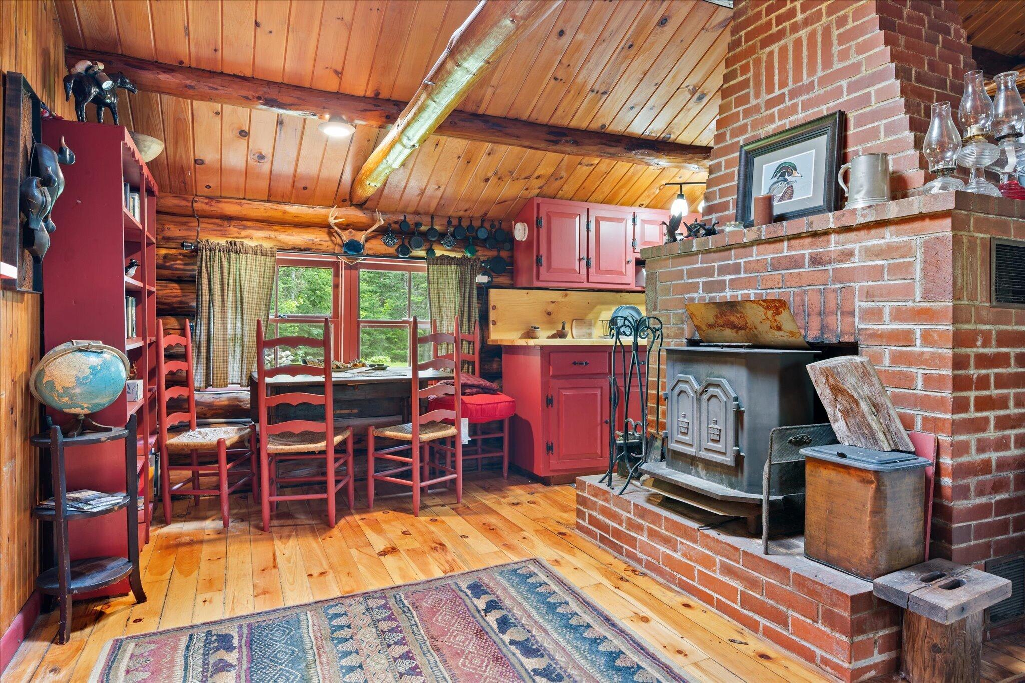 22 Old Ml Road Talmadge, ME 04492 - Photo 24 of 51 Fireplace with woodstove insert...