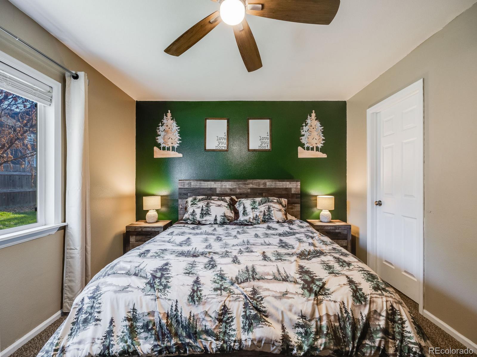 6360 Viewpoint Avenue Firestone, CO 80504 - Photo 20 of 27 a bedroom with a bed and painting on the wall