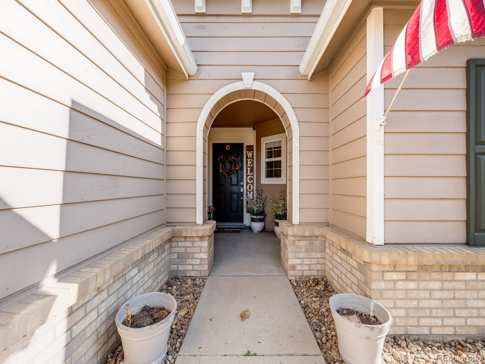 6360 Viewpoint Avenue Firestone, CO 80504 - Photo 4 of 27 a view of a door and a window