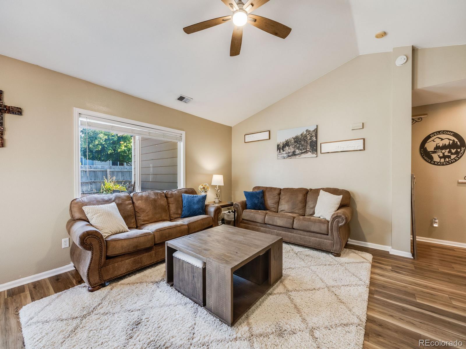 6360 Viewpoint Avenue Firestone, CO 80504 - Photo 6 of 27 a living room with furniture and a large window