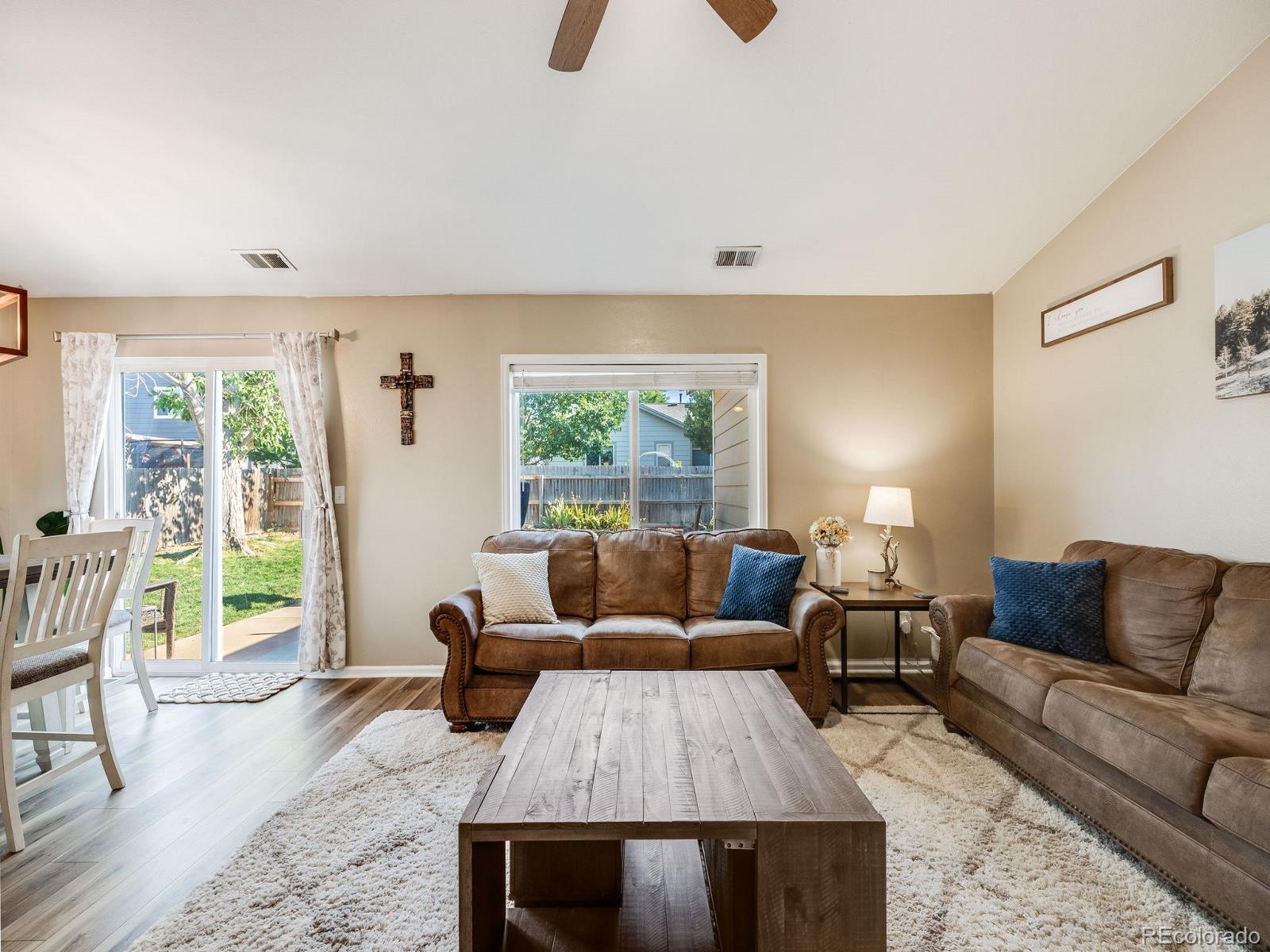 6360 Viewpoint Avenue Firestone, CO 80504 - Photo 7 of 27 a living room with furniture and a large window