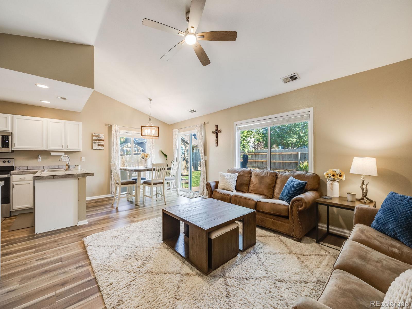 6360 Viewpoint Avenue Firestone, CO 80504 - Photo 8 of 27 a living room with furniture and a large window