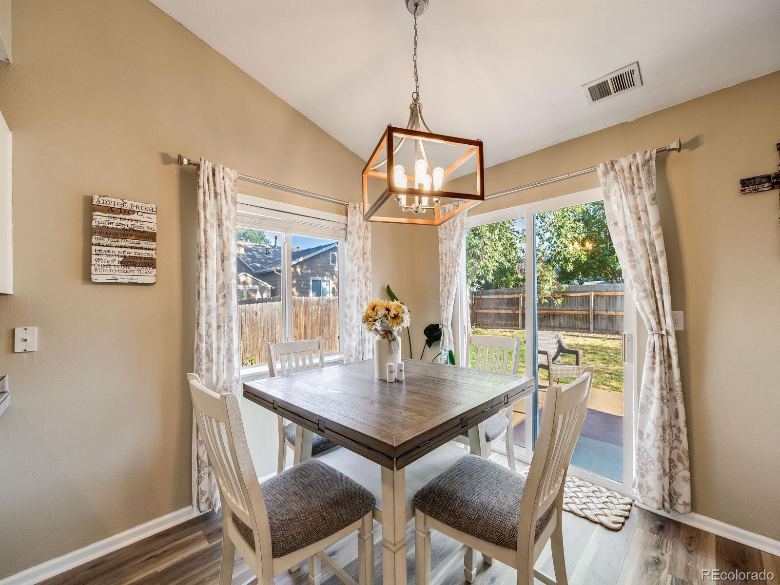 6360 Viewpoint Avenue Firestone, CO 80504 - Photo 10 of 27 a view of a dining room with furniture window and outside view
