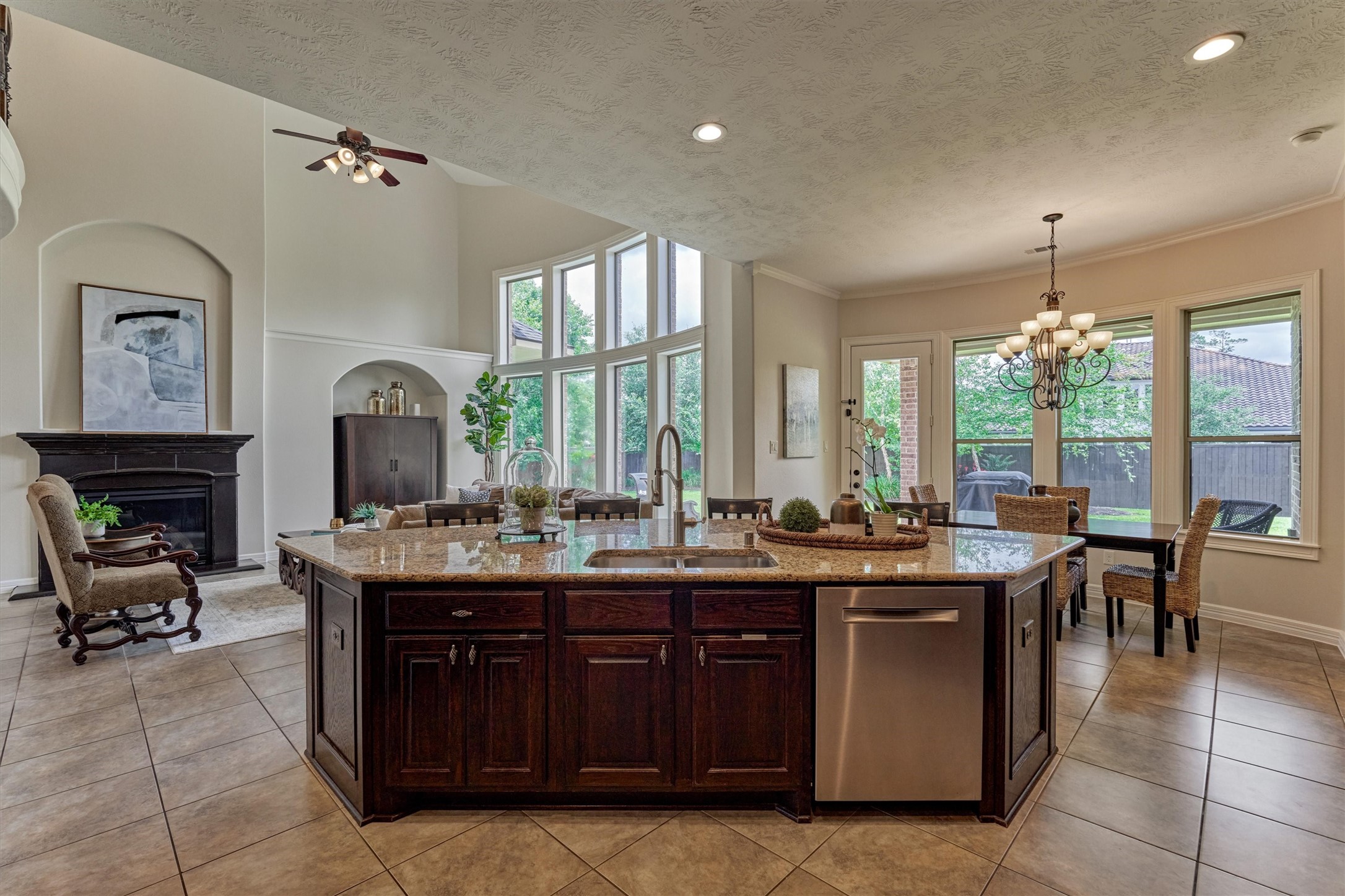 67 South Sage Sparrow Circle Spring, TX 77389 - Photo 23 of 49 a view of a kitchen with granite countertop a sink and cabinets