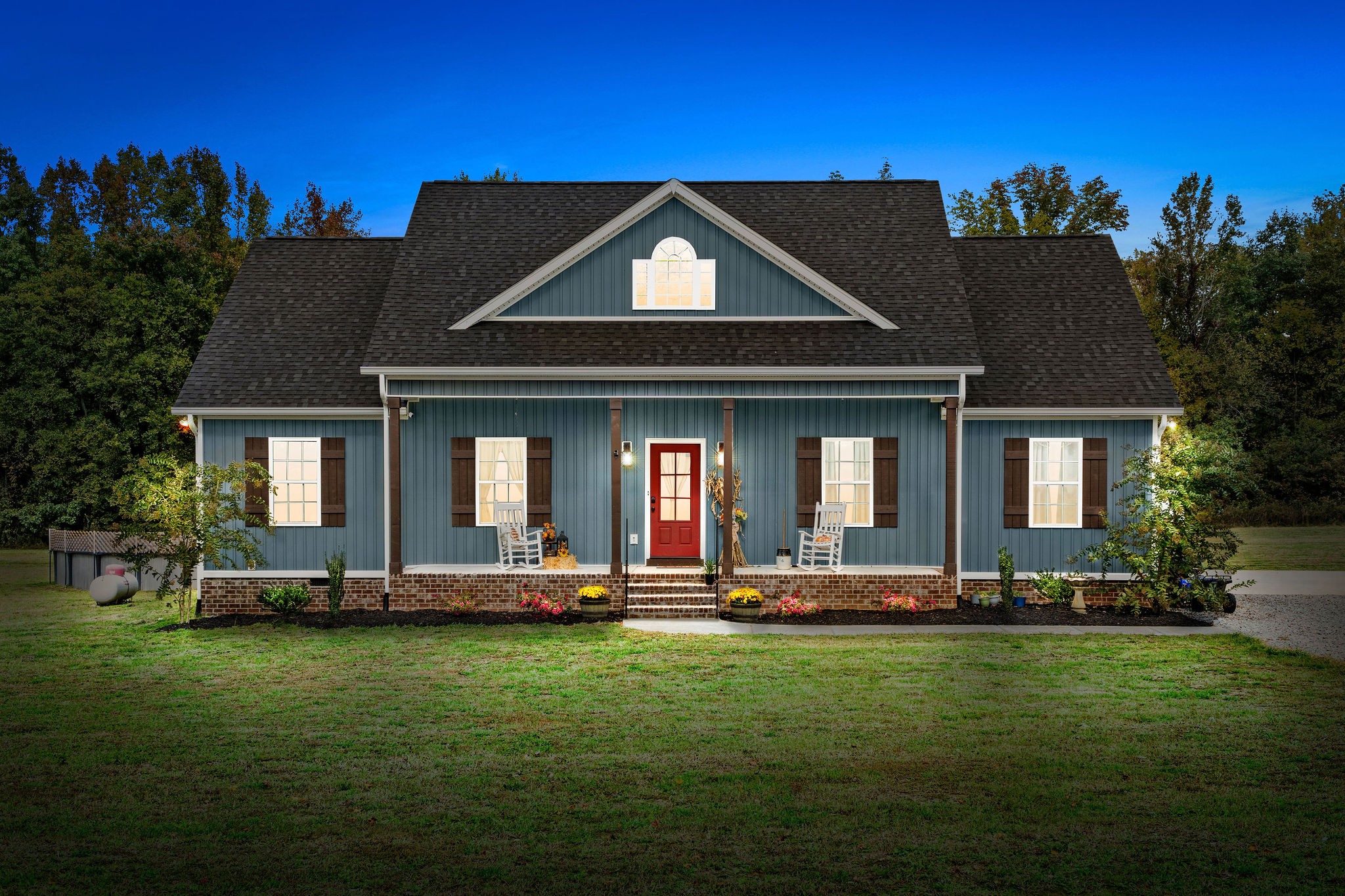 5008 William Woodard Road Springfield, TN 37172 - Photo 1 of 1 a front view of a house with a garden