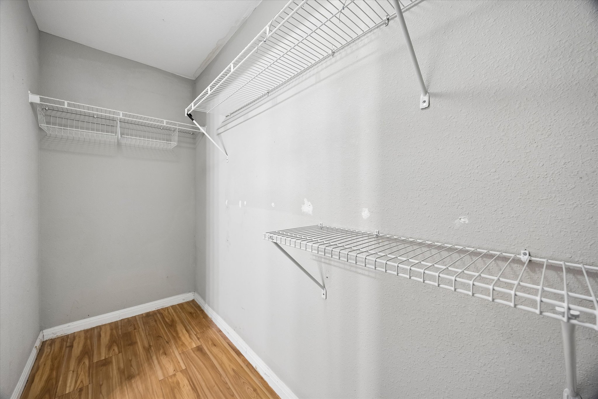 2502 Leon Street, Unit 506 Austin, TX 78705 - Photo 14 of 15 a view of a room with racks on the wall