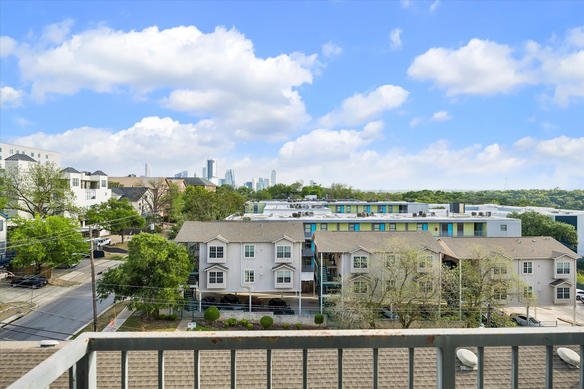 2502 Leon Street, Unit 506 Austin, TX 78705 - Photo 5 of 15 a view of a lake from a balcony