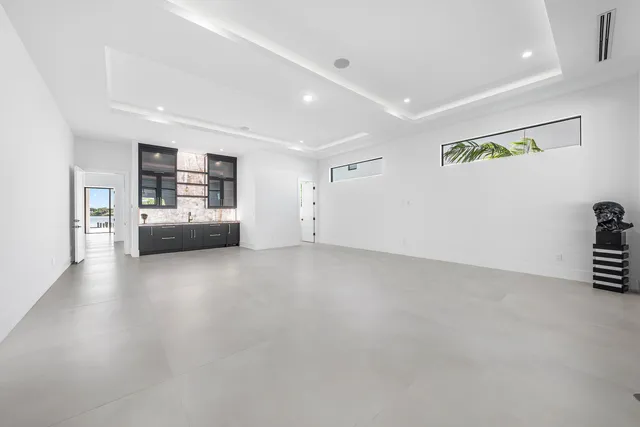 a view of a lake with a palm tree