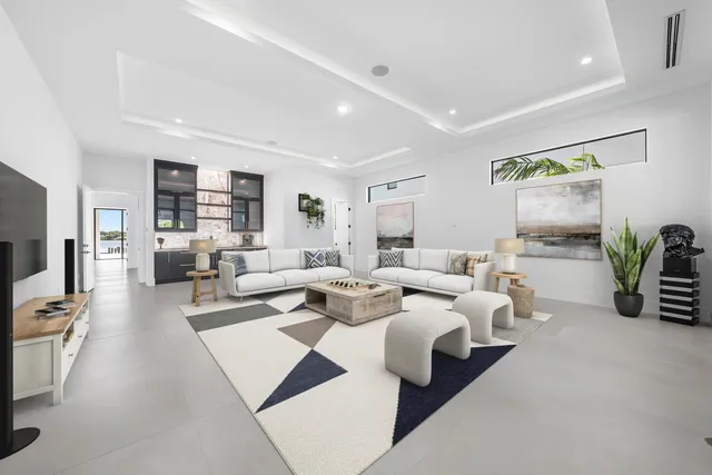 a view of pool with outdoor seating