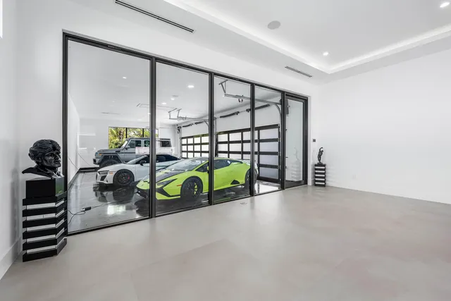 a view of swimming pool with a lounge chairs