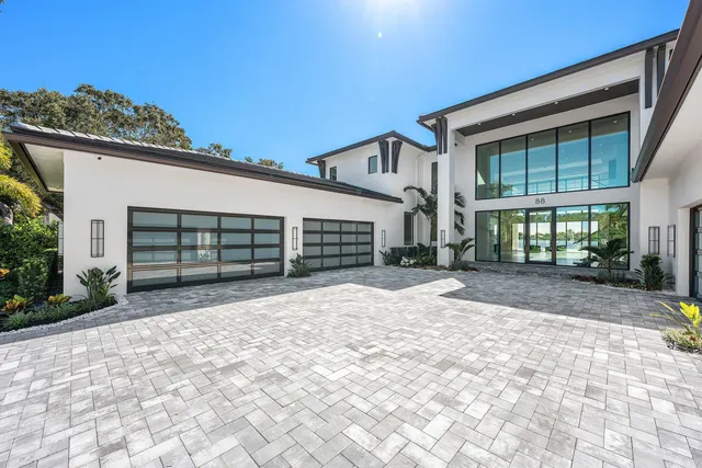 a kitchen with stainless steel appliances granite countertop a stove and a refrigerator