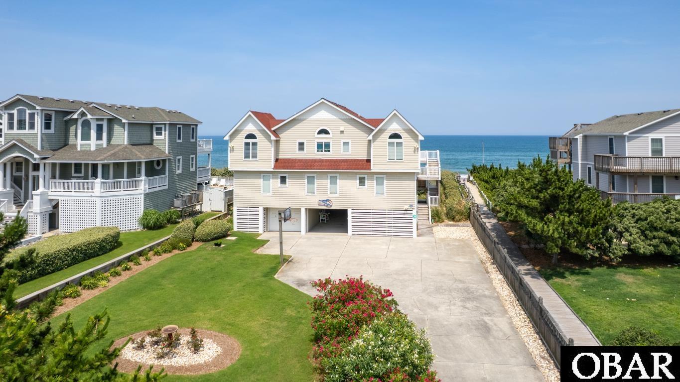 129 Bufflehead Road Duck, NC 27949 - Photo 1 of 50 Beautifully Landscaped