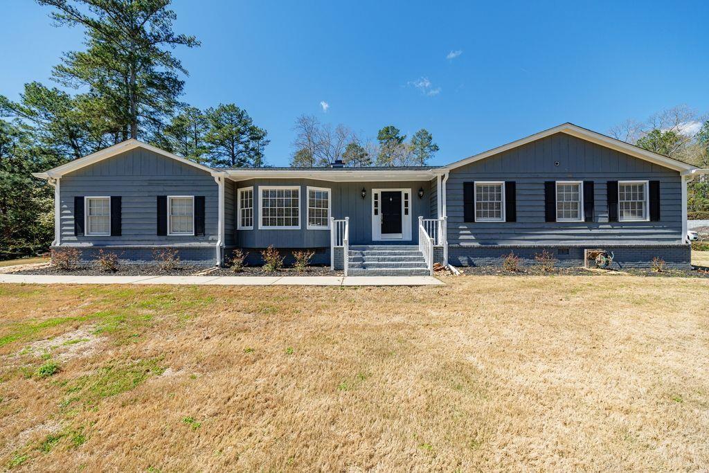 4883 Garrards Ridge Roswell, GA 30075 - Photo 1 of 1 a house view with a outdoor space