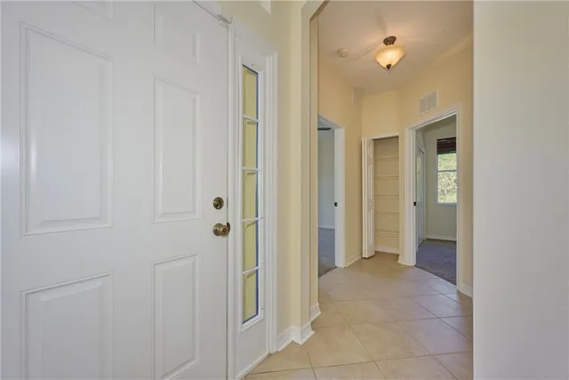 a bathroom with a toilet a sink and shower