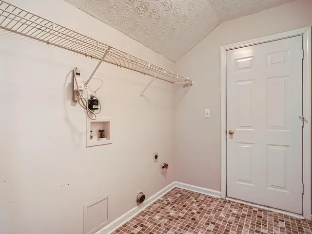 a view of a room with rack on the wall