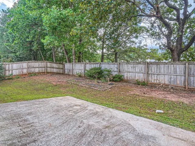 a view of a backyard with a small cabin