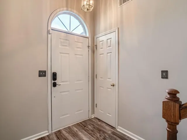 a view of a livingroom from a hallway