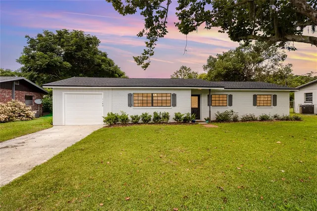 a view of outdoor space yard and front view of house