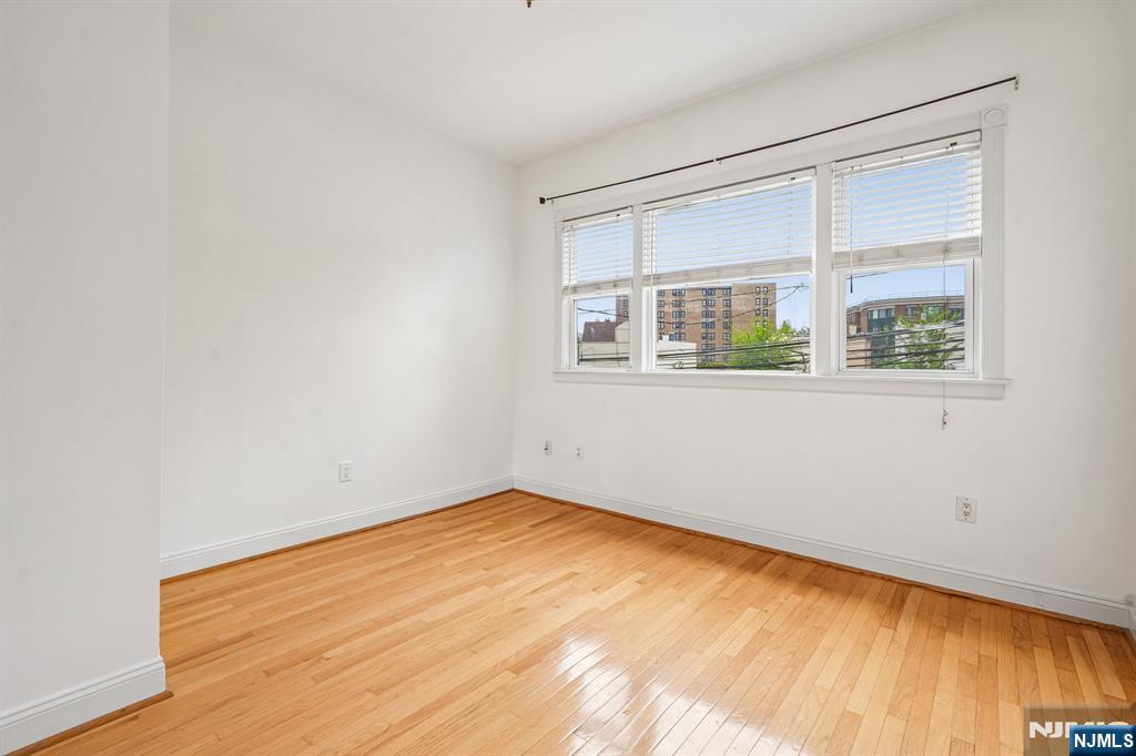 90 A Hackensack Plank Road Weehawken, NJ 07086 - Photo 24 of 40 an empty room with a window