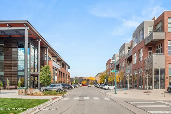 a view of a building with a street