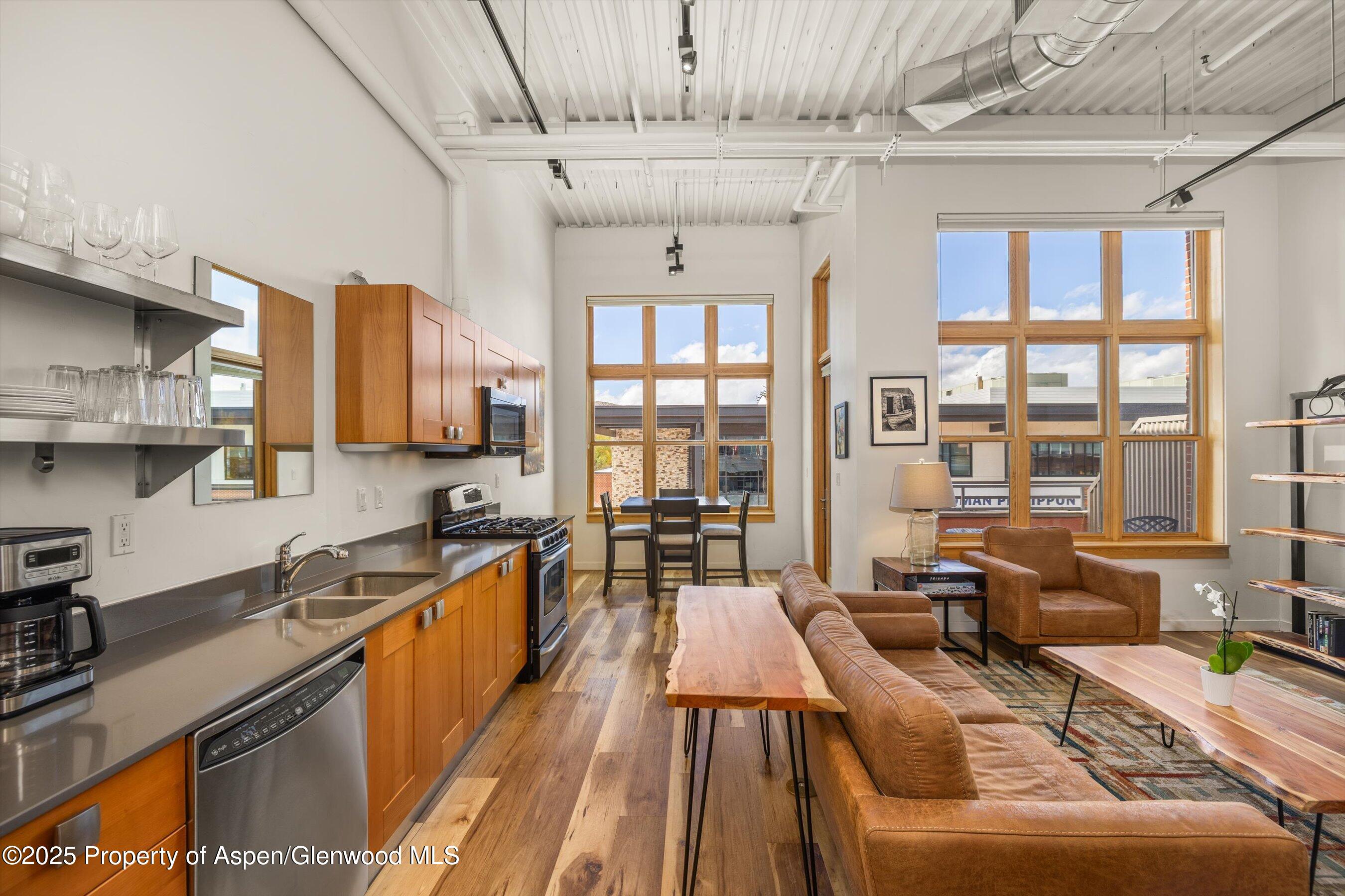 231 Robinson Street, Unit 302 Basalt, CO 81621 - Photo 5 of 17 a large kitchen with cabinets