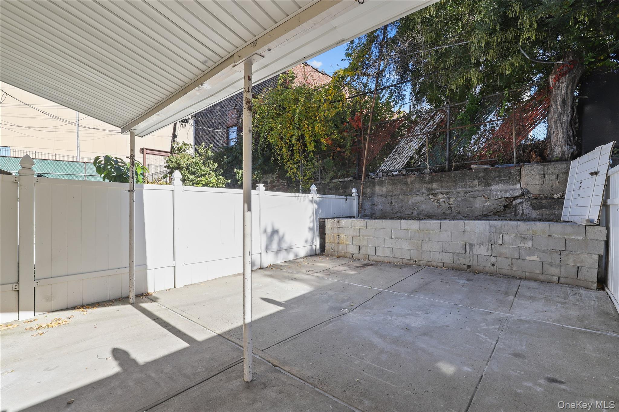 1448 Edwards Avenue Bronx, NY 10461 - Photo 25 of 28 a view of a backyard