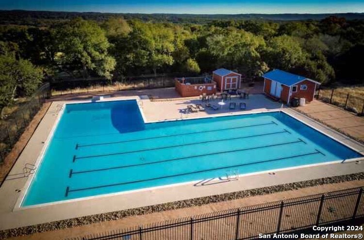350 Restless Wind Spring Branch, TX 78070 - Photo 6 of 7 a view of a two chair in the balcony