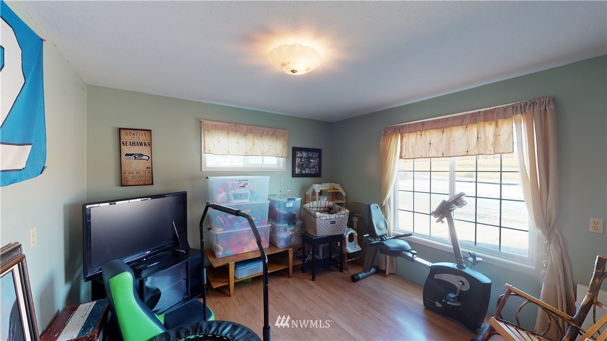346 Burnap Road Touchet, WA 99360 - Photo 14 of 40 a view of a workspace with furniture and a window