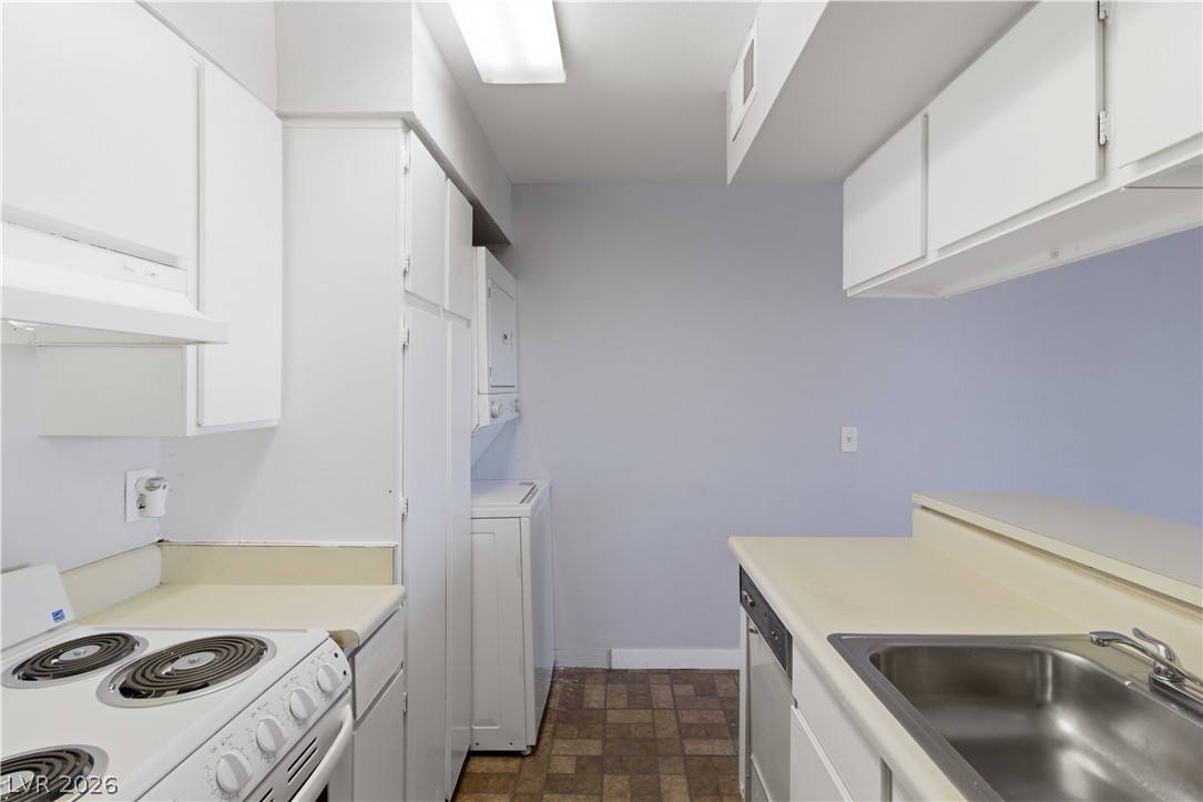 2221 West Bonanza Road, Unit 28 Las Vegas, NV 89106 - Photo 11 of 15 Functional kitchen with ample cabinetry and essential appliances awaits your personal touch.
