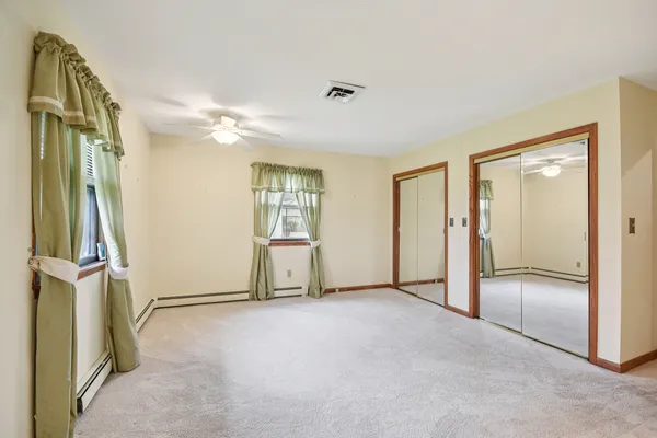 a view of empty room with windows