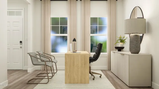 a view of table and chair with potted plant on the table