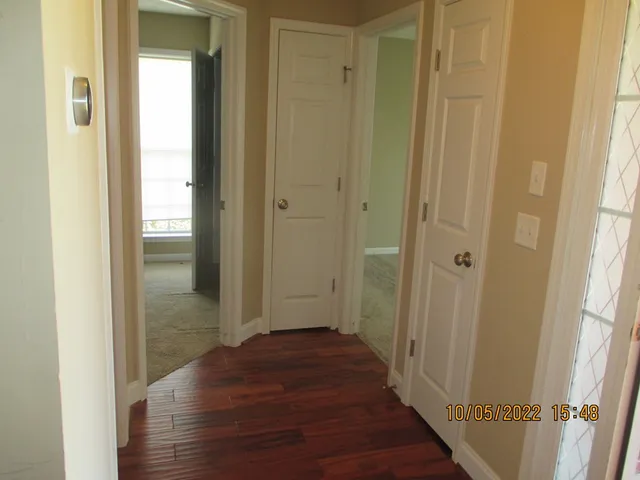 a view of a bathroom with a glass door